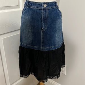 Indulgence Jeans distressed denim and black cotton skirt, size 16.